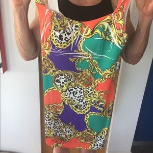 60’s style mini dress.  Size LG approx a 10-12.